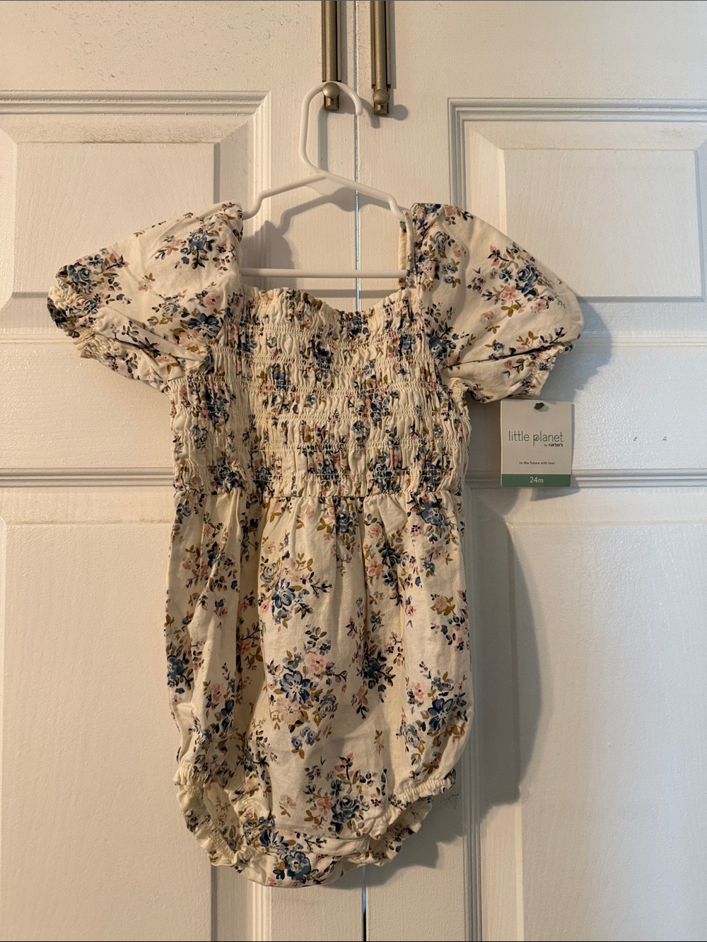 Little Planet Cream Floral Smocked Baby One-Piece